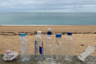 Plastic bottles on the beach 