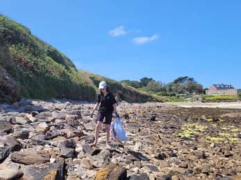 Camille at a beach clean