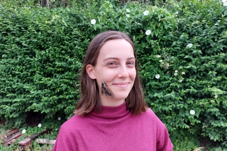 Camille with a hawk-moth on her face!