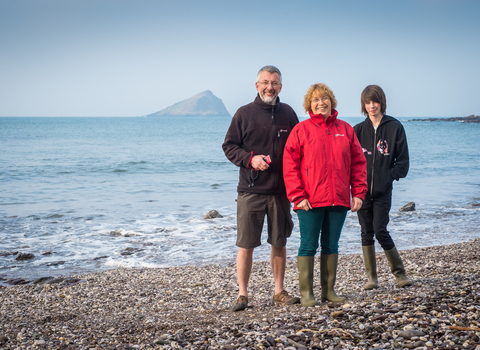 Paul and his family on the beach